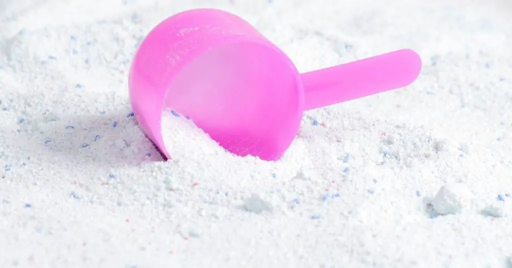 Natural washing powder with a pink scoop - Clean and Tidy Living