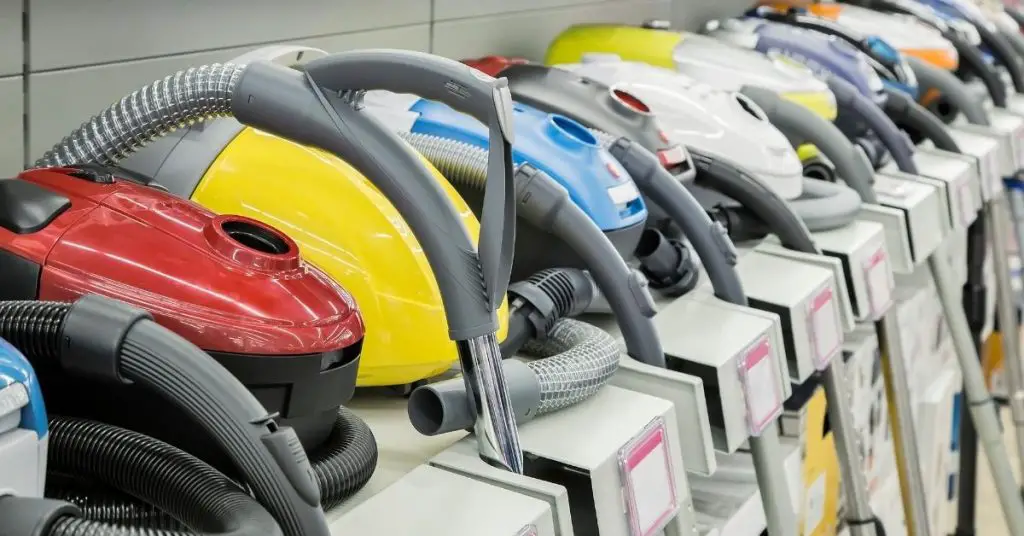 Row of Vacuum Cleaners on a Shelf in a Shop - Best Vacuum Cleaner Under £200 - Clean and Tidy Living