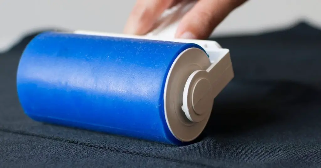 Lint Roller on Fabric - Why do Clothes Bobble - Clean and Tidy Living