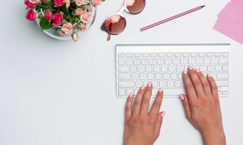 Clean and Tidy Living Person Typing on Laptop